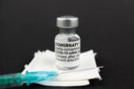 A BioNTech / Pfizer vial (called Corminaty) with syringe and swabs!