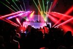People dancing inside dim room