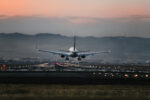 Plane landing on runway