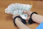 handcuffs, money, corruption