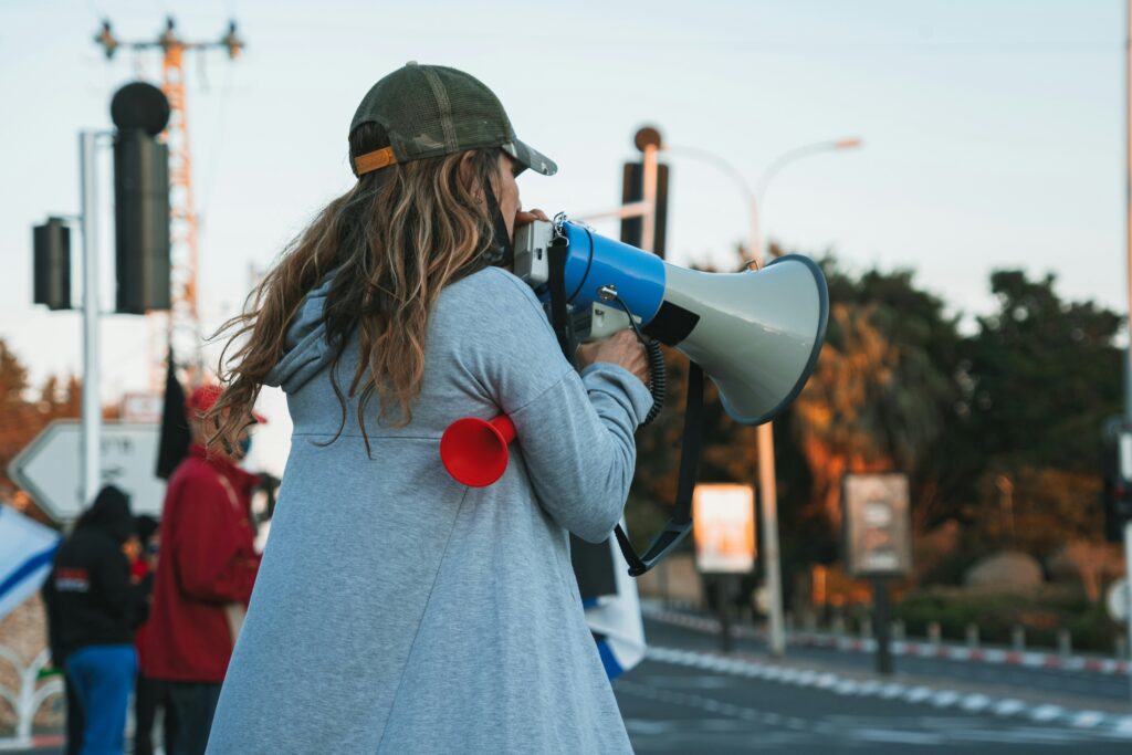 Woman with a megaphone at a protest