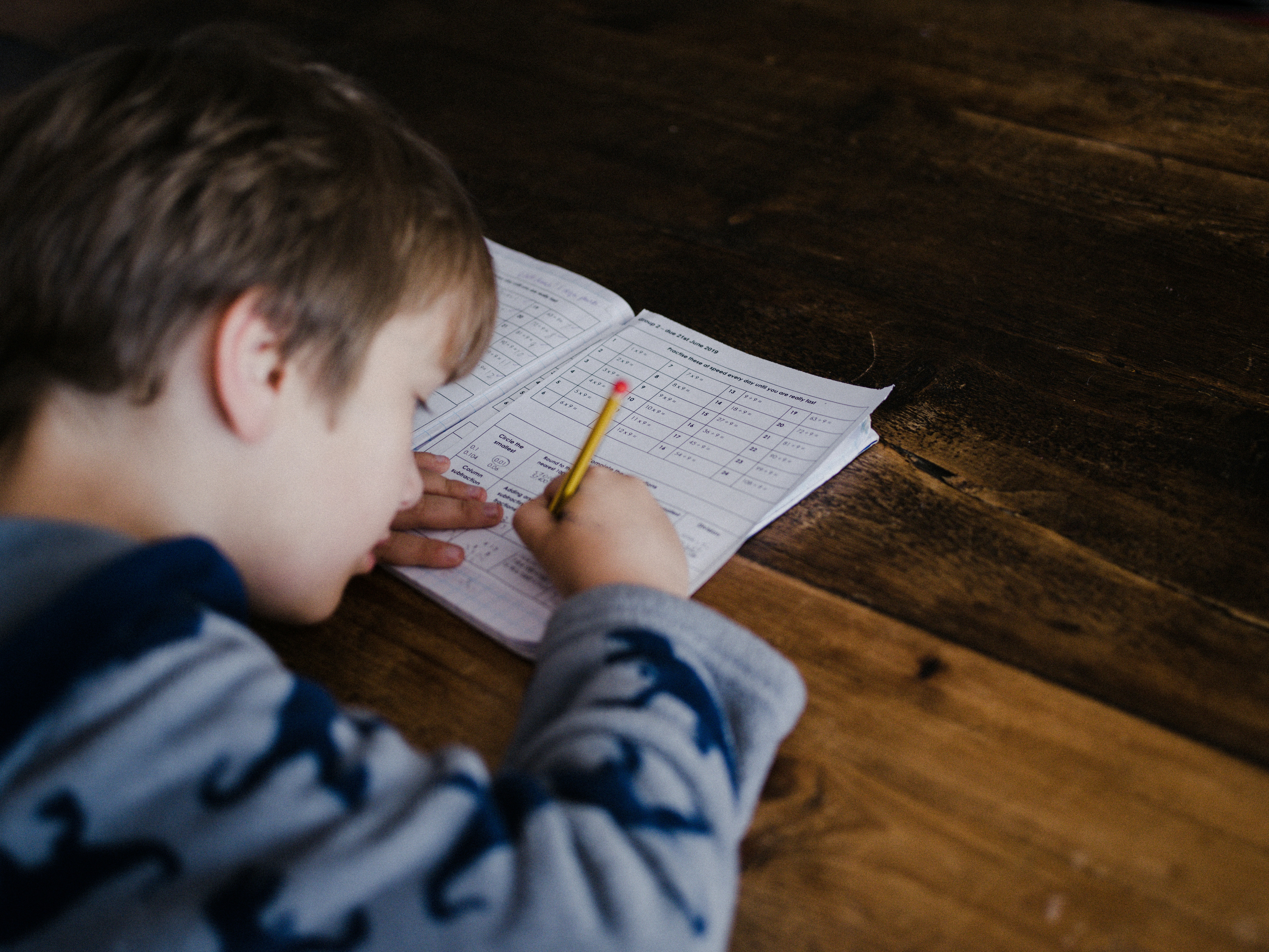 Child completing maths homework